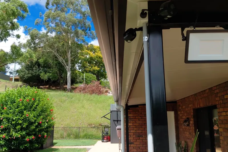 New COLORBOND steel gutter with a slotted overflow front and matching fascia under the eave of a Northern Rivers home
